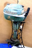 Johnson 3 Sea Horse outboard boat motor is about 3' long. Original graphics. Motor has compression,