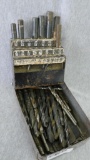 A whole mess of twist drills, plus a drill gauge.