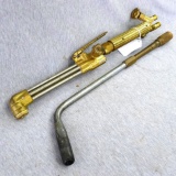 Oxweld W-17 torch handle, CW-23 cutting head, and 150 rosebud head. Valves feel about right, oxygen