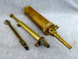 Muzzleloading accessories - Traditions black powder flask with push valve; graduated brass powder