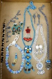 Native American style beaded jewelry including necklaces, earrings, faux silver and turquois
