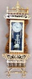 Beautiful ornate wall clock with scroll work; measures 11