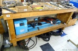 Rolling workbench with lower shelf is 6.5' x 2' x 39