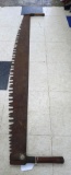 Two man crosscut saw is 5-1/2' long. Nice display piece with deep tooth gullets and only a few