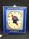 Eye catching Pabst Blue Ribbon lighted beer clock is about 12