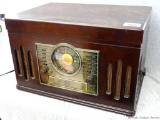 Replica vintage stereo with radio, record, 3-CD and cassette players; measures 17-1/2