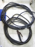 50' plus 30' 2/0 welding cable with a twist lock connector in the middle, a stinger on one end and a