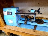Cummins steel framed wood lathe runs smoothly. Lathe ways are nearly 4' long with a 7