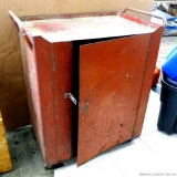 Metal rolling cart with closed storage underneath; measures 31
