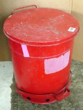 Red metal garbage can with foot pedal; measures 17