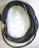 Around 60' 2/0 welding cable with ground clamp and terminal ends.