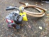 Portable water pump with Kawasaki engine, 1'' dis charge and suction hose. Gas tank is dry but