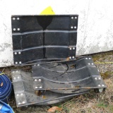 Three steel car dollies, each approx 15'' x 20''. Add a fourth dolly and you'll have a set.