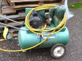 Two hp, 230 volt, twin cylinder air compressor, tank is approx 31'' x 14''. Seller notes compressor