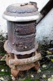 P.D. Beckwith no.16 cast iron round oak parlor stove. Stands about 3 1/2' high. Ready for
