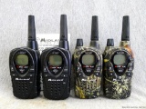 Midland X-tra Talk radio's, 2 model LXT303 and 2 GXT650. All 4 power up and displays work and