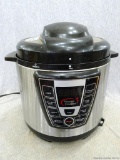 Power Cooker, 4 quart with steaming tray and non stick coating.