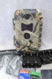 Predator Evolution trailcam with 2 compact flash cards and owners manual.