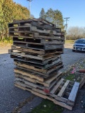 Pile of hardwood and softwood pallets, is approx 5' tall. Most pallets are around 48'' x 40'' , some
