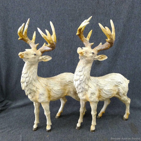 Neutral reindeer figurines are about 16" tall and in overall good condition and nice looking.