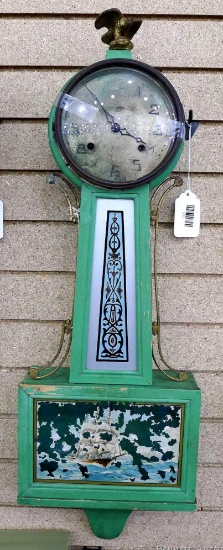 New Haven banjo style key-wound wall clock is about 32" tall. Original tag on back. Seller notes