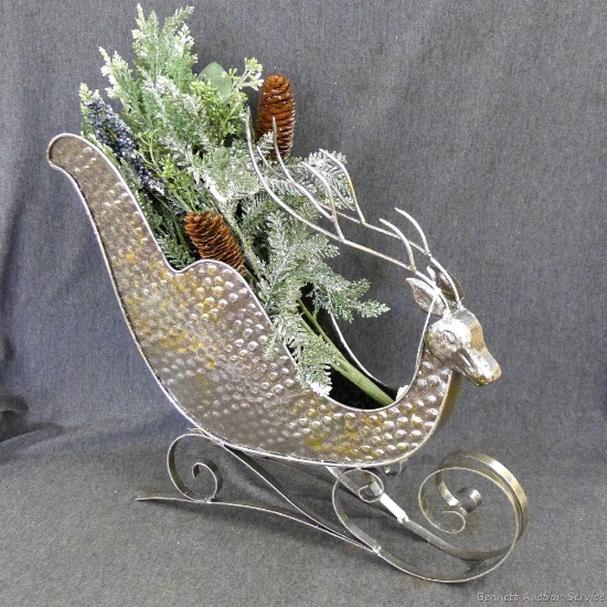 Fun sleigh decoration with a nicer quality 22" stem of faux greenery. Both in good condition, sleigh
