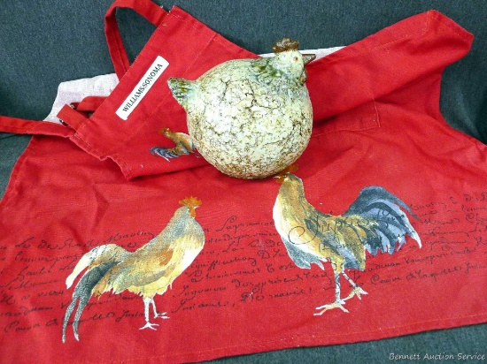 Fun chicken decoration and a rooster apron. Both in good condition. Chicken about 8" long and 7"