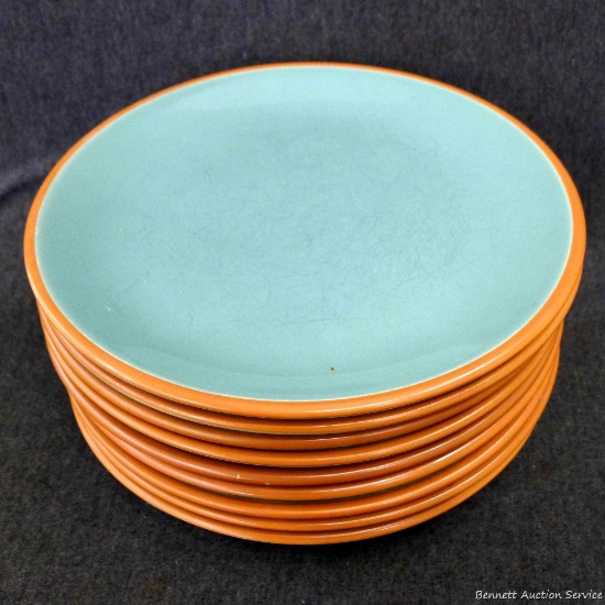 Nine 11" diameter Bobby Flay stoneware-type dinner plates are in good condition.