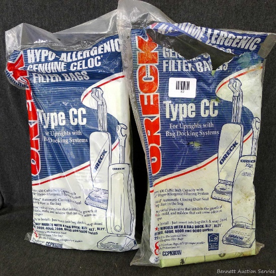 Oreck Type CC hypo-allergenic vacuum cleaner bags - one new package has eight, the opened bag has