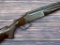 J. Stevens Model 022-410 over-under rifle/shotgun. Barrels are 24