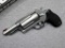 Taurus Judge revolver shoots .45 Long Colt cartridges and .410 shot shells. Barrel is 3
