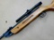 Pellet rifle has a beautiful wooden stock and Simmons scope. Scope is clear and bright. Has very