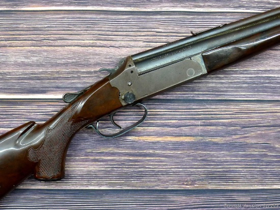 J. Stevens Model 022-410 over-under rifle/shotgun. Barrels are 24" with shotgun barrel being bright