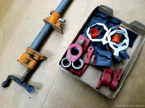 4' Pony brand pipe clamp, Brink & Cotton clamps for 1-1/8" pipe, 2" x 2-1/4" Rockler pads, and four