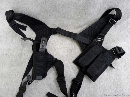 De Santis Model B6 handgun harness holster comes with a pouch to hold two mags. Look up the Model to