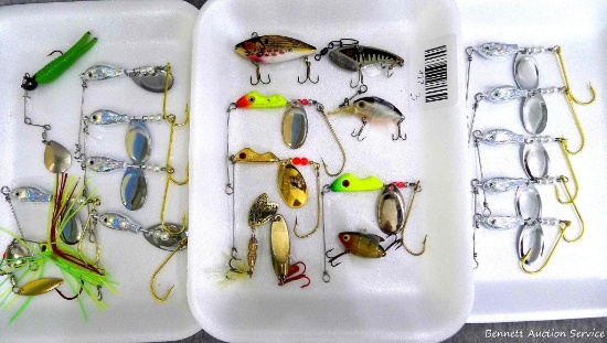 Twenty-one fishing lures up to 2-1/2" by Heddon, Erie Dearie and others.