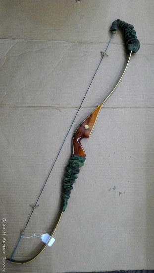 Bear Archery Co. glass-powered Kodiak Hunter recurve bow is currently 54" long. Marked 9TI535,