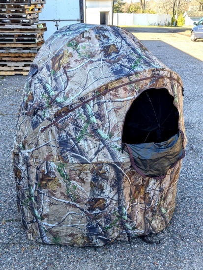 Two-person Ameristep foldable hunting chair blind. Double chair seat is 53" over arms x 20" x 36"