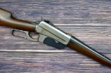 Winchester Model 1895 lever action rifle in .30 Army is fitted with a Lyman Model 21 sight patented