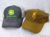 Waxed canvas Browning cap and John Deere cap.