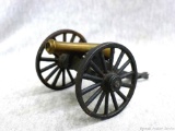 M.F. Co. brass and cast iron miniature black powder cannon is approx 5-1/2