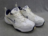 Nike Air Monarch 4E Full Length Air tennis shoes are men's size 11. In good shape.