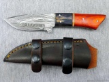 Beautiful fixed blade sheath knife has a damascus blade and is 8