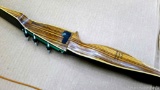 Bear Archery Glass-Powered Tigercat recurve bow with strings. In good condition with no delamination