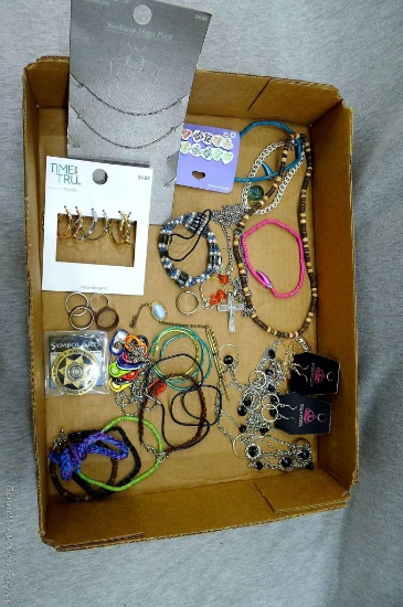 Some fun jewelry. Has cute hoop earrings, necklaces, rings, and more. Longest necklace measures 20''