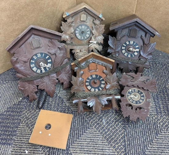 Germany cuckoo clocks mainly for parts and repair. Largest clock measures 11'' x 5'' x 8''. Put the