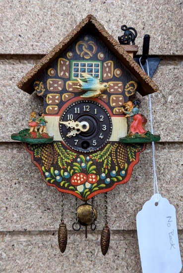 Adorable miniature clock is a mere 5-1/2" over cabinet. Needs back. Bird moves when you swing the