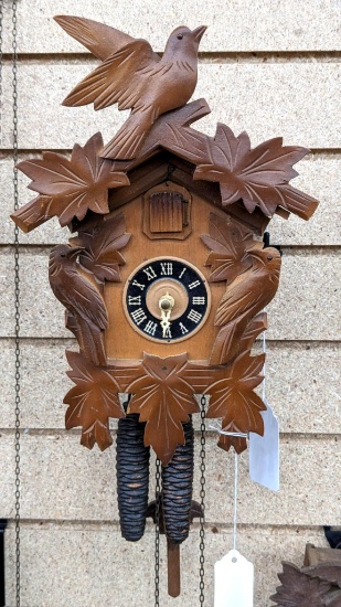Nice cuckoo clock. Seller notes runs but needs hands. Cabinet in good condition and measures about