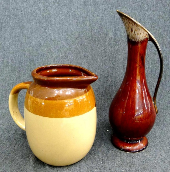 Beautiful earth toned pitchers. Would make for nice decorations or a place for flowers, tallest