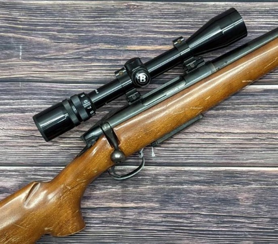 Remington Model 788 bolt action rifle in .243 is topped with a Bushnell 3-9x38 scope. Barrel is 18"